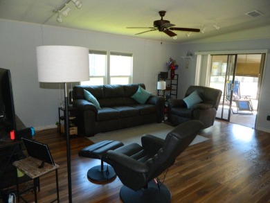 This 1984 Sherman home is 24x40 offering you 960 sq ft of open on Grasslands Golf and Country Club in Florida - for sale on GolfHomes.com, golf home, golf lot