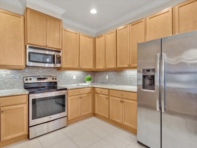 Enjoy Florida living at its finest in this beautifully on Sandpiper Golf Club in Florida - for sale on GolfHomes.com, golf home, golf lot