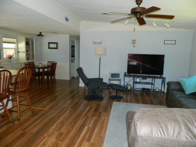 This 1984 Sherman home is 24x40 offering you 960 sq ft of open on Grasslands Golf and Country Club in Florida - for sale on GolfHomes.com, golf home, golf lot