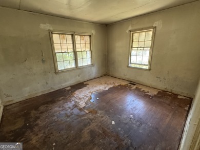 Charming East Lake Bungalow - Ideal for First-Time Buyers or on Charlie Yates Golf Course in Georgia - for sale on GolfHomes.com, golf home, golf lot