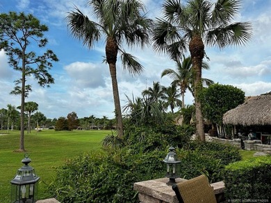 This stunning property is a masterpiece of elegance and on St. Lucie Trail Golf Club in Florida - for sale on GolfHomes.com, golf home, golf lot