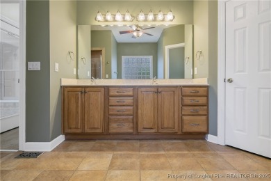 Welcome to this all-brick custom built 4-bedroom, 3-bathroom on Anderson Creek Golf Club in North Carolina - for sale on GolfHomes.com, golf home, golf lot