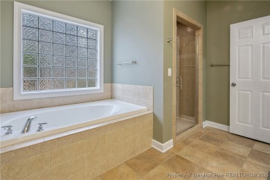 Welcome to this all-brick custom built 4-bedroom, 3-bathroom on Anderson Creek Golf Club in North Carolina - for sale on GolfHomes.com, golf home, golf lot