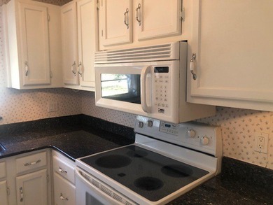 Vista Royale 55+ PRICED TO SELL QUICKLY. Needs light updating on The American Golf Club in Florida - for sale on GolfHomes.com, golf home, golf lot