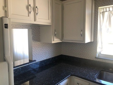 Vista Royale 55+ PRICED TO SELL QUICKLY. Needs light updating on The American Golf Club in Florida - for sale on GolfHomes.com, golf home, golf lot