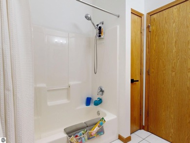 Discover your dream lifestyle in this 3 bedroom 2 bath home that on The Pines Golf Course at Lake Isabella in Michigan - for sale on GolfHomes.com, golf home, golf lot