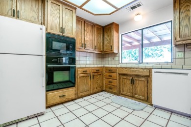 Charming home in Millwood! Situated on an extra large lot in on Visalia Country Club in California - for sale on GolfHomes.com, golf home, golf lot