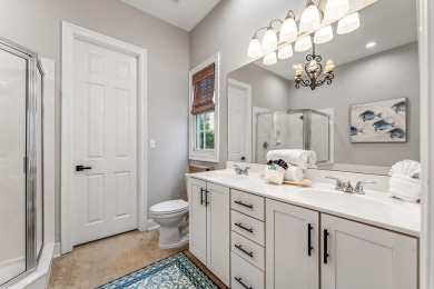 Lovingly nicknamed ''Sea La Vie,'' this Caribbean-inspired on Sandestin Golf and Beach Resort - The Links in Florida - for sale on GolfHomes.com, golf home, golf lot