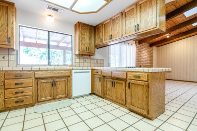 Charming home in Millwood! Situated on an extra large lot in on Visalia Country Club in California - for sale on GolfHomes.com, golf home, golf lot