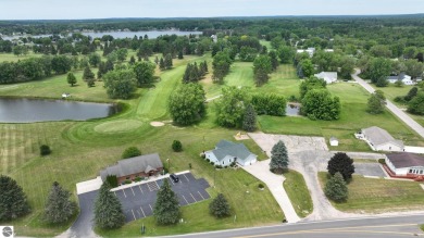 Discover your dream lifestyle in this 3 bedroom 2 bath home that on The Pines Golf Course at Lake Isabella in Michigan - for sale on GolfHomes.com, golf home, golf lot