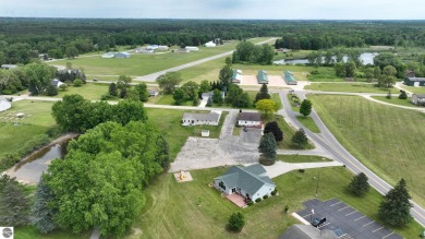 Discover your dream lifestyle in this 3 bedroom 2 bath home that on The Pines Golf Course at Lake Isabella in Michigan - for sale on GolfHomes.com, golf home, golf lot