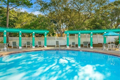 Lovingly nicknamed ''Sea La Vie,'' this Caribbean-inspired on Sandestin Golf and Beach Resort - The Links in Florida - for sale on GolfHomes.com, golf home, golf lot