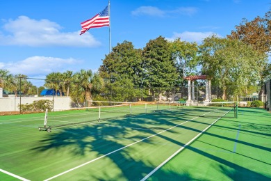 Lovingly nicknamed ''Sea La Vie,'' this Caribbean-inspired on Sandestin Golf and Beach Resort - The Links in Florida - for sale on GolfHomes.com, golf home, golf lot