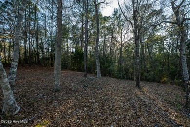 Located at the end of a quiet cul-de-sac, this approximately on Rivers Edge Golf Club in North Carolina - for sale on GolfHomes.com, golf home, golf lot
