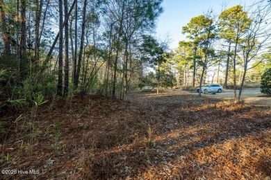 Located at the end of a quiet cul-de-sac, this approximately on Rivers Edge Golf Club in North Carolina - for sale on GolfHomes.com, golf home, golf lot