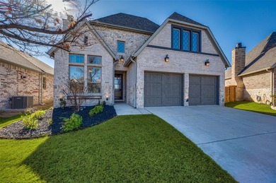 Step into effortless living in this beautiful one-story, located on The Tribute At the Colony in Texas - for sale on GolfHomes.com, golf home, golf lot