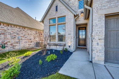 Step into effortless living in this beautiful one-story, located on The Tribute At the Colony in Texas - for sale on GolfHomes.com, golf home, golf lot