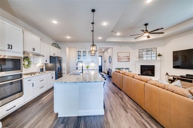 Step into effortless living in this beautiful one-story, located on The Tribute At the Colony in Texas - for sale on GolfHomes.com, golf home, golf lot