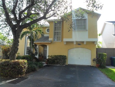 Single-family home in DORAL PARK on a premium lot overlooking on Jim McLean Signature Course in Florida - for sale on GolfHomes.com, golf home, golf lot