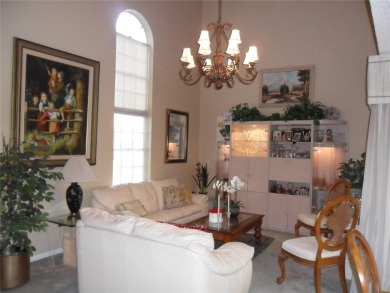 Single-family home in DORAL PARK on a premium lot overlooking on Jim McLean Signature Course in Florida - for sale on GolfHomes.com, golf home, golf lot