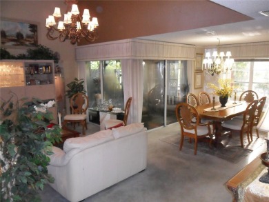 Single-family home in DORAL PARK on a premium lot overlooking on Jim McLean Signature Course in Florida - for sale on GolfHomes.com, golf home, golf lot