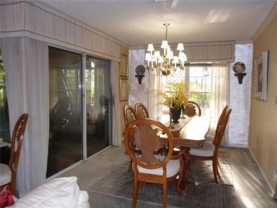 Single-family home in DORAL PARK on a premium lot overlooking on Jim McLean Signature Course in Florida - for sale on GolfHomes.com, golf home, golf lot