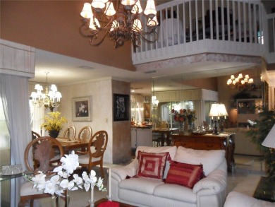 Single-family home in DORAL PARK on a premium lot overlooking on Jim McLean Signature Course in Florida - for sale on GolfHomes.com, golf home, golf lot