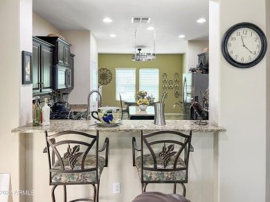 **Paradise in the Desert** Very well maintained home with really on Poston Butte Golf Club in Arizona - for sale on GolfHomes.com, golf home, golf lot