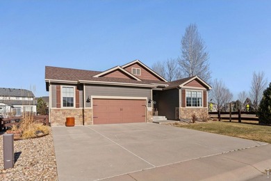 Welcome to this beautifully maintained ranch-style home located on Pelican Lakes Golf and Country Club in Colorado - for sale on GolfHomes.com, golf home, golf lot
