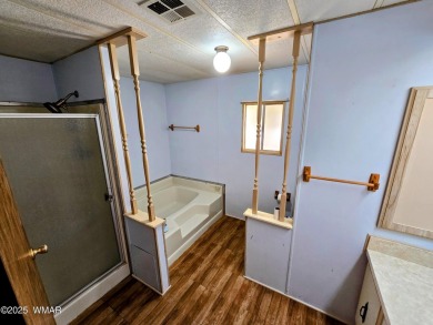 Welcome to this lovingly maintained 2-bedroom, 2-bath home on Bison Golf and Country Club in Arizona - for sale on GolfHomes.com, golf home, golf lot