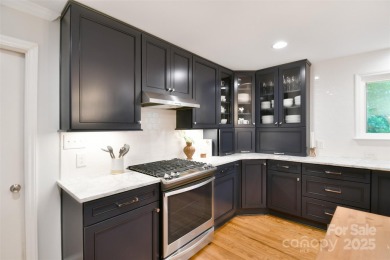 This fabulous updated brick ranch with basement in vibrant Merry on Charlotte Country Club in North Carolina - for sale on GolfHomes.com, golf home, golf lot