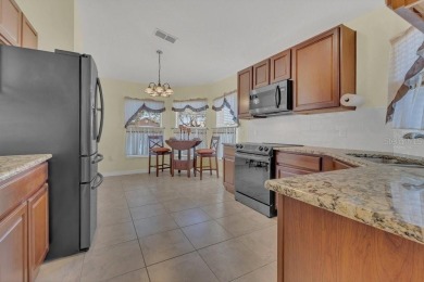 PRICE REDUCED! CHARMING HOME IN THE AWARD WINNING COMMUNITY on Stonegate Golf Club in Florida - for sale on GolfHomes.com, golf home, golf lot