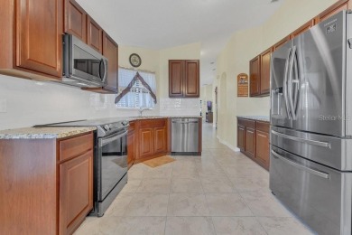 PRICE REDUCED! CHARMING HOME IN THE AWARD WINNING COMMUNITY on Stonegate Golf Club in Florida - for sale on GolfHomes.com, golf home, golf lot