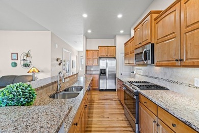 Welcome to this beautifully maintained ranch-style home located on Pelican Lakes Golf and Country Club in Colorado - for sale on GolfHomes.com, golf home, golf lot