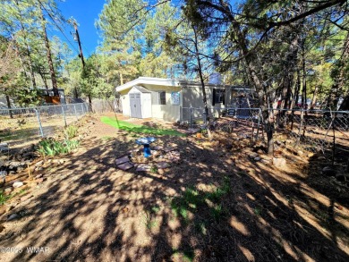Welcome to this lovingly maintained 2-bedroom, 2-bath home on Bison Golf and Country Club in Arizona - for sale on GolfHomes.com, golf home, golf lot