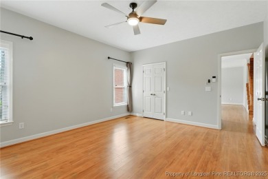 A beautifully updated brick home nestled on a peaceful corner on Kings Grant Golf and Country Club in North Carolina - for sale on GolfHomes.com, golf home, golf lot