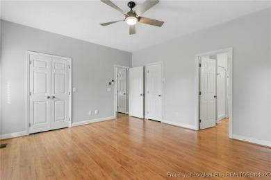 A beautifully updated brick home nestled on a peaceful corner on Kings Grant Golf and Country Club in North Carolina - for sale on GolfHomes.com, golf home, golf lot