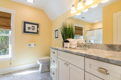 Nestled in the heart of Bald Head Island, this five-bedroom on Bald Head Island Golf Club in North Carolina - for sale on GolfHomes.com, golf home, golf lot