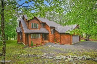 Stunning Cedar Chalet on the 15th Fairway of Paupack Hills in on Paupack Hills Golf and Country Club in Pennsylvania - for sale on GolfHomes.com, golf home, golf lot