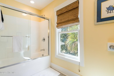 Nestled in the heart of Bald Head Island, this five-bedroom on Bald Head Island Golf Club in North Carolina - for sale on GolfHomes.com, golf home, golf lot