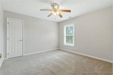 A beautifully updated brick home nestled on a peaceful corner on Kings Grant Golf and Country Club in North Carolina - for sale on GolfHomes.com, golf home, golf lot