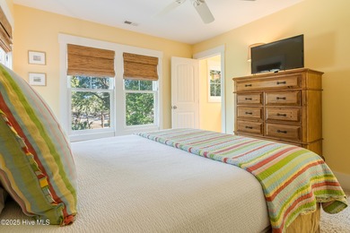 Nestled in the heart of Bald Head Island, this five-bedroom on Bald Head Island Golf Club in North Carolina - for sale on GolfHomes.com, golf home, golf lot