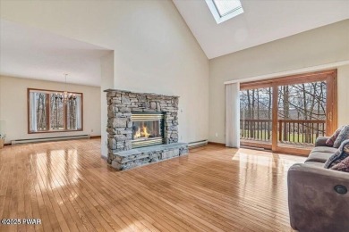 Stunning Cedar Chalet on the 15th Fairway of Paupack Hills in on Paupack Hills Golf and Country Club in Pennsylvania - for sale on GolfHomes.com, golf home, golf lot