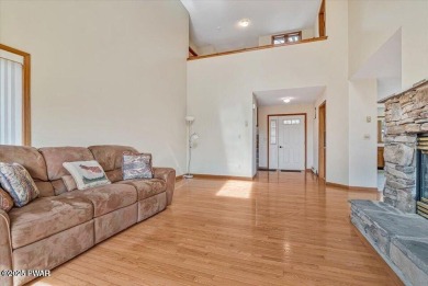 Stunning Cedar Chalet on the 15th Fairway of Paupack Hills in on Paupack Hills Golf and Country Club in Pennsylvania - for sale on GolfHomes.com, golf home, golf lot