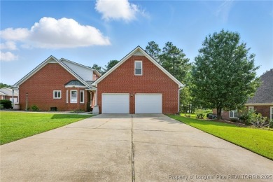 A beautifully updated brick home nestled on a peaceful corner on Kings Grant Golf and Country Club in North Carolina - for sale on GolfHomes.com, golf home, golf lot