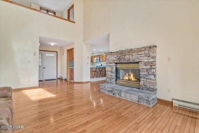 Stunning Cedar Chalet on the 15th Fairway of Paupack Hills in on Paupack Hills Golf and Country Club in Pennsylvania - for sale on GolfHomes.com, golf home, golf lot