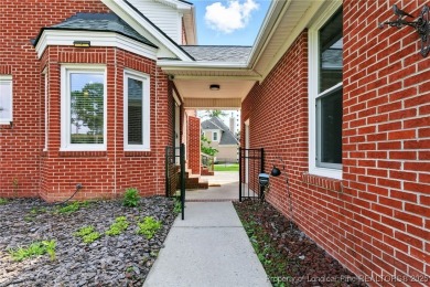 A beautifully updated brick home nestled on a peaceful corner on Kings Grant Golf and Country Club in North Carolina - for sale on GolfHomes.com, golf home, golf lot
