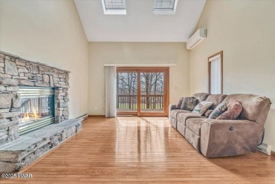 Stunning Cedar Chalet on the 15th Fairway of Paupack Hills in on Paupack Hills Golf and Country Club in Pennsylvania - for sale on GolfHomes.com, golf home, golf lot