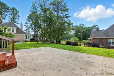 A beautifully updated brick home nestled on a peaceful corner on Kings Grant Golf and Country Club in North Carolina - for sale on GolfHomes.com, golf home, golf lot