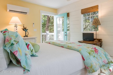 Nestled in the heart of Bald Head Island, this five-bedroom on Bald Head Island Golf Club in North Carolina - for sale on GolfHomes.com, golf home, golf lot